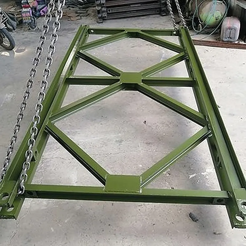 Bailey panel being lifted by chain slings in the workshop